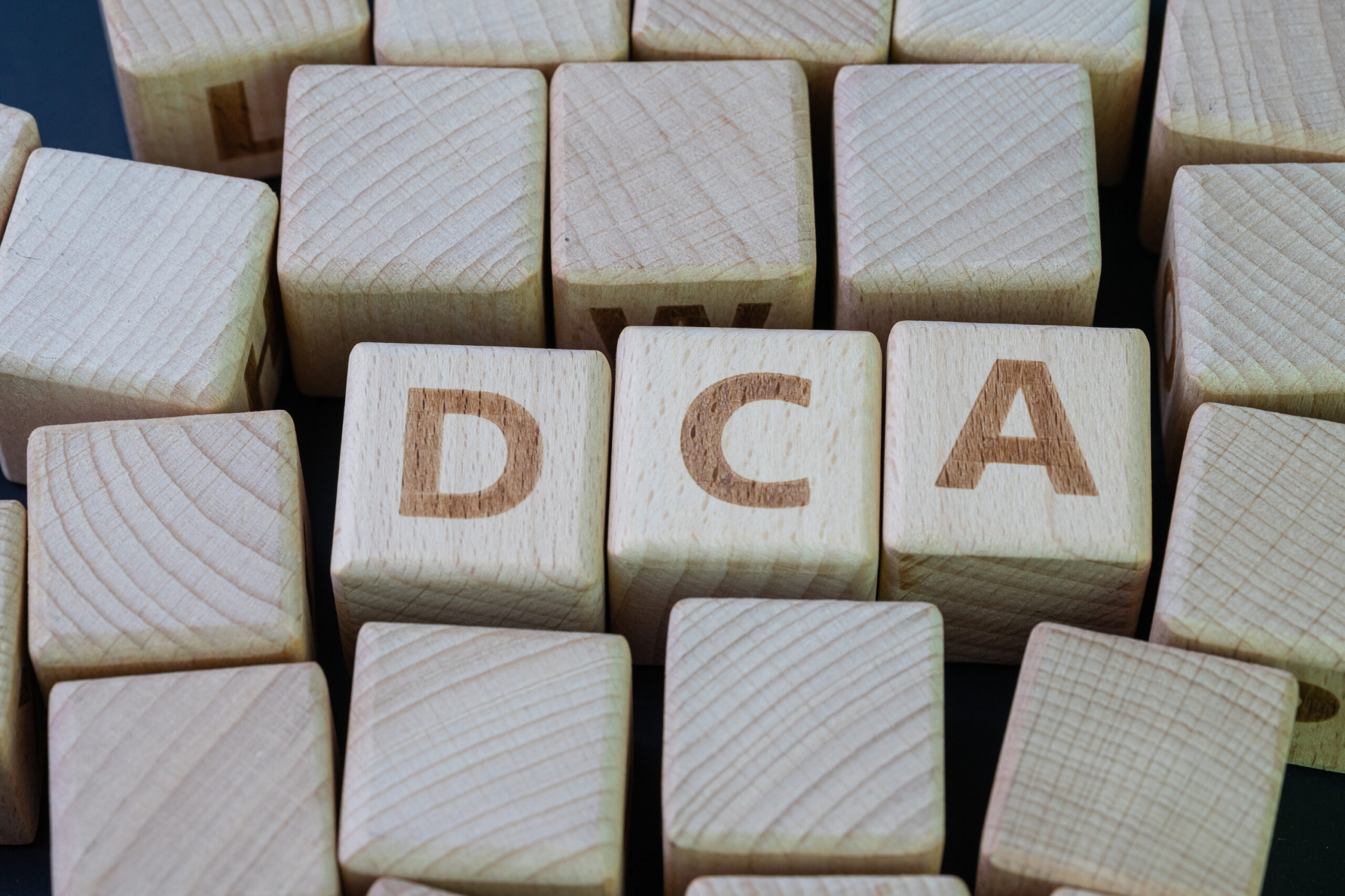 Investing Strategies Comparison Blog photo showing DCA cubes
