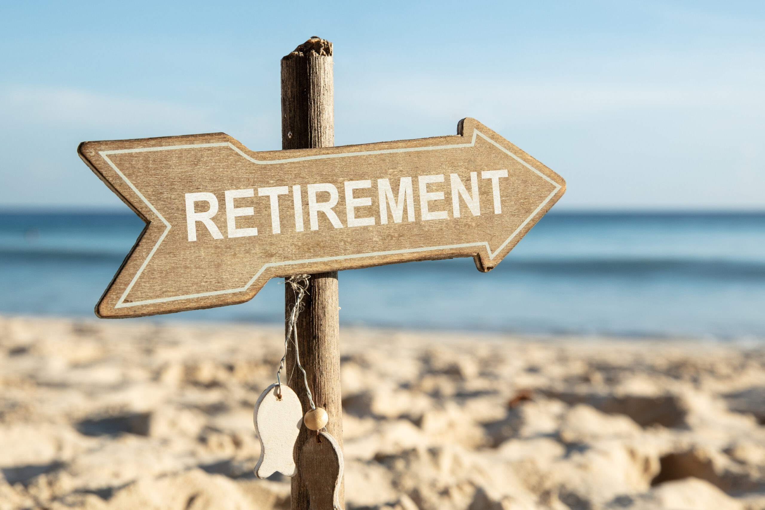 Retirement Income Drawdown Strategy Blog photo of retirement sign in the sand